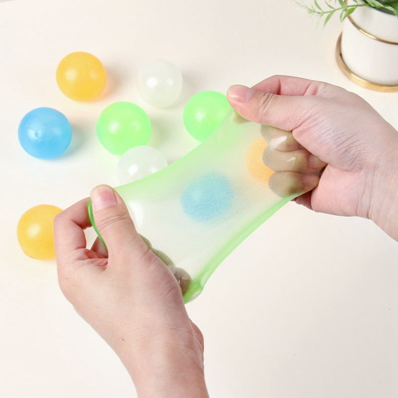 Luminescent Sticky Bouncing Balls